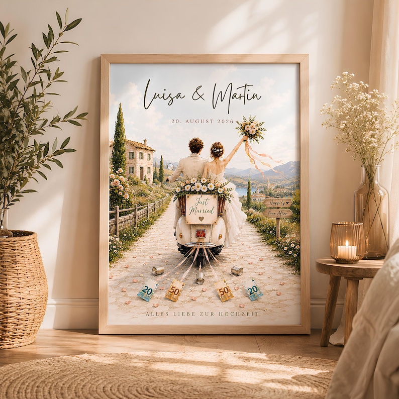 May include: A framed wall art print featuring a couple on a scooter with the text Luisa & Martin, 20. AUGUST 2026, Just Married, and ALLES LIEBE ZUR HOCHZEIT. The scene shows a stone path, a villa, and currency notes tied to the back of the scooter.