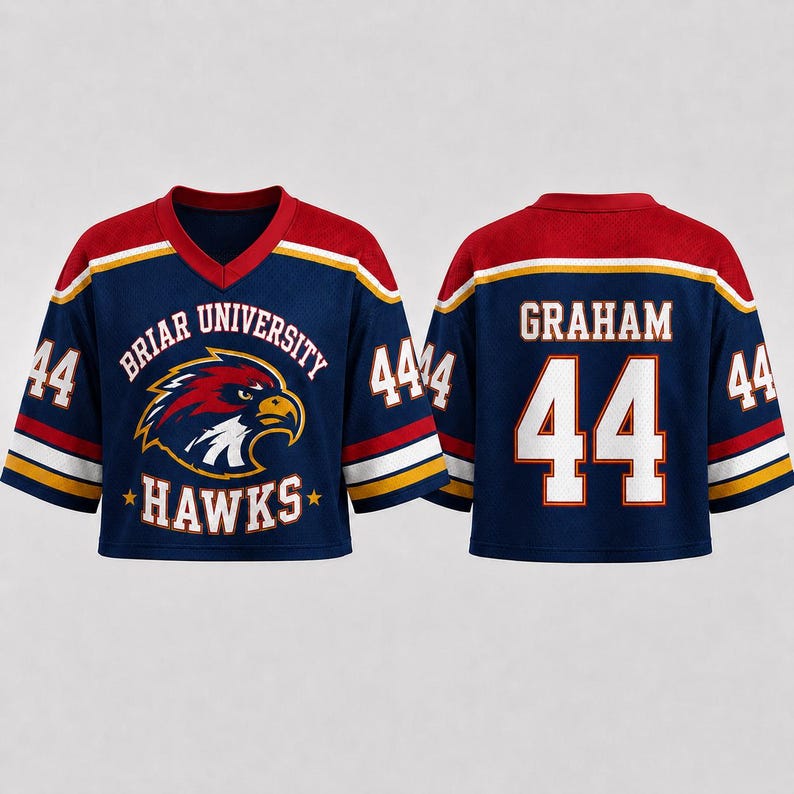 A blue and red hockey jersey with the name 'GRAHAM' and the number '44' on the back, and the name 'BRAIR UNIVERSITY HAWKS' on the front.