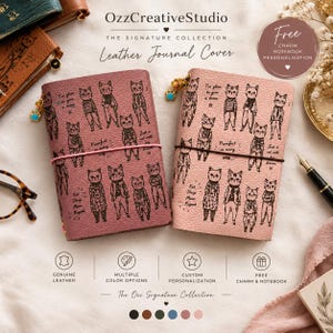 May include: Two leather journal covers in mauve and light pink, each featuring a repeating black line art pattern of anthropomorphic cats. The covers are secured with elastic bands and include small decorative charms attached to the top corner.