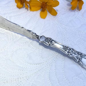 Antique Silverplate Twisted Butter Knife: Grape Motif, 1881 Rogers &quot;La Vigne&quot;
