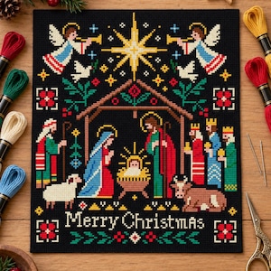 May include: A black fabric cross-stitch embroidery featuring a nativity scene with Mary, Joseph, the infant Jesus, angels, shepherds, and three kings under a large yellow star. The text Merry Christmas is stitched in white at the bottom.