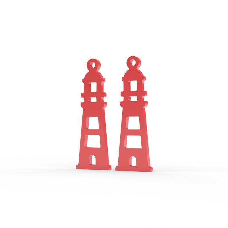 Puede incluir: Dos dijes id&eacute;nticos en forma de faro de color rojo, cada uno con un lazo circular en la parte superior, un cuerpo c&oacute;nico con recortes horizontales y una peque&ntilde;a abertura arqueada en la base, presentados como un par de componentes planos.