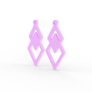 May include: A pair of light purple geometric earrings. Each earring features a diamond shape with a smaller diamond shape inside, and a loop at the top for hanging. The earrings are set against a white background.