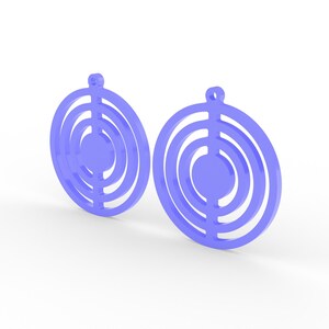 May include: Two light purple earrings with a circular design. Each earring features concentric circles with a solid center and a small loop at the top for hanging. The earrings are set against a white background.