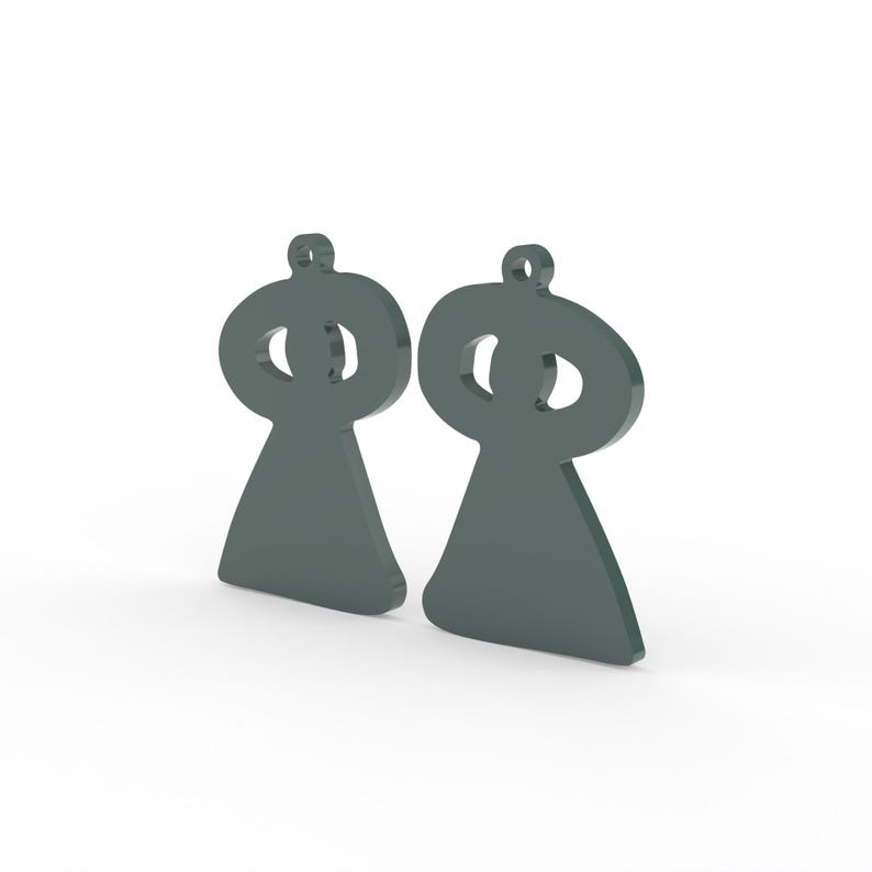 May include: Two dark gray, abstract-shaped pendants. Each pendant has a rounded top with a circular cutout and a teardrop-shaped base. The pendants are displayed against a white background.