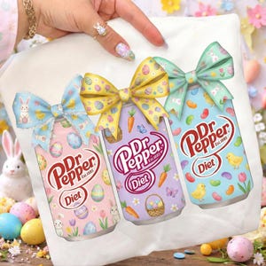 May include: Three Dr. Pepper Diet cans with Easter-themed designs. Each can features a different color scheme and bow. The cans are decorated with Easter eggs, bunnies, carrots, and other spring elements. The text "Dr Pepper Est. 1885 Diet" is visible.