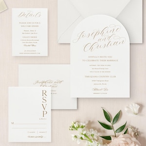 May include: Wedding invitation suite with a white background and gold lettering. The main invitation features a calligraphic design with the names "Josephine and Christian" and details about the wedding ceremony. The RSVP card has a simple design with the letters "RSVP" in a vertical column. The welcome dinner card has a simple design with the text "Details" in a calligraphic font.