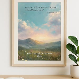 May include: Framed art print featuring a landscape painting with a quote from Proverbs 16:3: "Commit to the Lord whatever you do, and He will establish your plans." The artwork is titled "Faith Through the Seasons 2026."