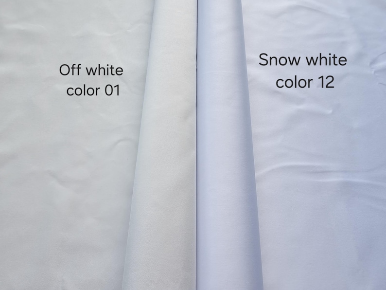Puede incluir: Dos rollos de tela mostrados uno al lado del otro. El rollo de la izquierda est&aacute; etiquetado como Off white color 01, mostrando un tono blanco cremoso c&aacute;lido. El rollo de la derecha est&aacute; etiquetado como Snow white color 12, mostrando una superficie de tela blanca brillante, fr&iacute;a y n&iacute;tida.