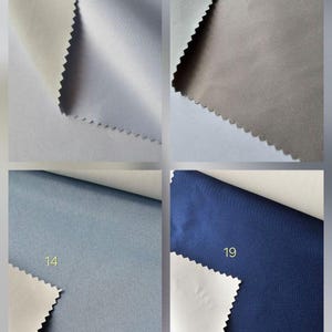 Puede incluir: Un collage de cuatro muestras de tela con bordes dentados. La muestra 12 es blanca, la 13 es gris claro, la 14 es azul polvoriento y la 19 es azul marino. Cada muestra muestra una superficie frontal lisa de color s&oacute;lido y un reverso m&aacute;s claro.