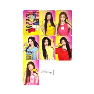 May include: A collection of rectangular cards featuring images of people holding yellow objects. The cards have a pink border. The people are wearing various colorful tops, including yellow, pink, red, and blue. Some cards have text.