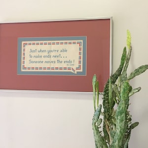 Vintage Framed Cross-Stitching &quot;Just When You&#39;re Able To Make Ends Meet... Someone Moves The Ends!&quot; Wall Hanging 1985