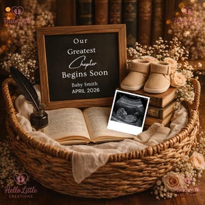 May include: A wicker basket holds a chalkboard sign with the text "Our Greatest Chapter Begins Soon," baby booties, a sonogram, and an open book. The scene is decorated with flowers and a quill pen.