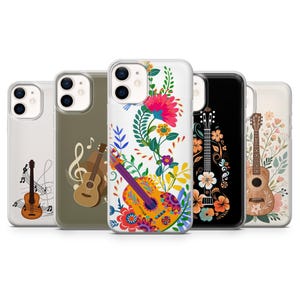 May include: A collection of phone cases featuring guitar designs. The cases showcase various artistic styles, including floral patterns, musical notes, and decorative guitar illustrations. The color palette includes vibrant hues and detailed artwork.