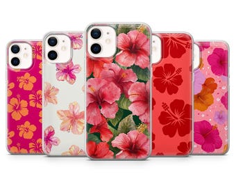 May include: A collection of phone cases featuring vibrant floral designs. The cases showcase hibiscus flowers in shades of pink, red, and orange, set against various backgrounds. The cases are designed to fit a smartphone.