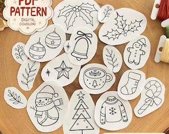 May include: A collection of 17 digital PDF pattern designs for Christmas ornaments and decorations. The designs include a snowman, Christmas tree, bell, star, gingerbread man, and other festive elements. The designs are black and white.