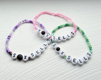 S*x Sells Friendship Bracelet