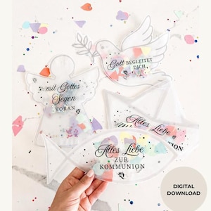 Puede incluir: Decoraciones de comunión de acrílico transparente en forma de ángel, paloma, pez y barco. Cada forma tiene texto en escritura negra y está llena de confeti colorido. Se ven las palabras "mit Gottes Segen VORAN", "Gott BEGLEITET DICH" y "Alles Liebe ZUR KOMMUNION".