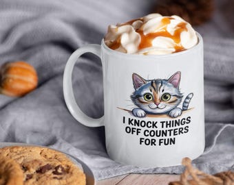 Funny Cat Mug: I Knock Things Off Counters Design
