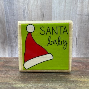 Sello de goma navideño de Papá Noel bebé usado Ver todas las fotos