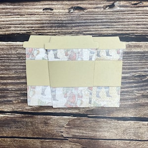 Porta tarjetas de regalo con forma de taza de café navideña de Papá Noel