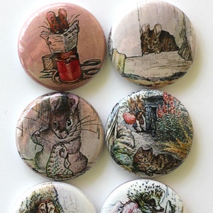 May include: Set of six round button pins featuring illustrations from Beatrix Potter's children's books. The pins feature images of a mouse reading a book, a mouse peeking out of a window, a mouse holding a piece of fabric, a cat sleeping, a hedgehog carrying a teapot, and a rabbit family.