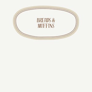 May include: A cream-colored page with the words "Breads & Muffins" inside a light brown oval. A sprig of purple flowers is in the lower right corner. The number 4 is in the lower right corner.