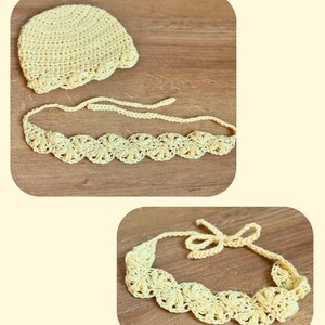 May include: A pale yellow crochet set consisting of a rounded cap and a matching tie-back headband. Both items feature a delicate, repeating shell-like stitch pattern throughout the design, crafted from a soft, light-colored yarn material.