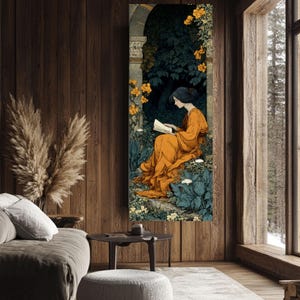 May include: A vertical rectangular wall art print featuring an illustration of a figure in a flowing orange robe sitting and reading a book within a dark stone archway surrounded by lush green foliage and vibrant yellow flowers in a forest setting.