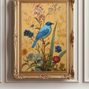 May include: A framed artwork featuring a blue bird perched on a branch amidst colorful flowers and foliage. The painting has a gold frame and a yellow background with floral patterns. The flowers include pink, blue, and red blooms.