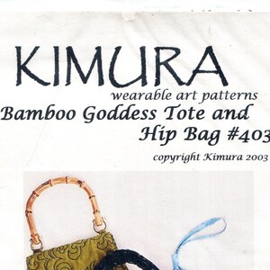 May include: A sewing pattern cover titled KIMURA wearable art patterns Bamboo Goddess Tote and Hip Bag #403 copyright Kimura 2003. It displays three bags: an olive green bag with bamboo handles, a blue koi fish print tote, and a light blue hip bag.