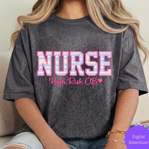 May include: Dark gray t-shirt with the word "NURSE" in a pink and blue plaid design. Below the word "NURSE" is the text "High Risk OB" in pink. The shirt is a digital download.