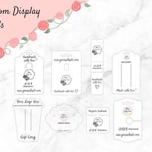 May include: A selection of white custom display cards in various shapes. Each card has space for a logo, social media icons, and a website address. The cards are designed for handmade items and accessories, with the words 'Handmade with love'.