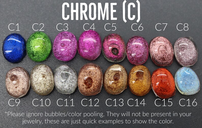 a collection of colorful glass beads or stones, each with a different color and texture, arranged in a grid pattern.