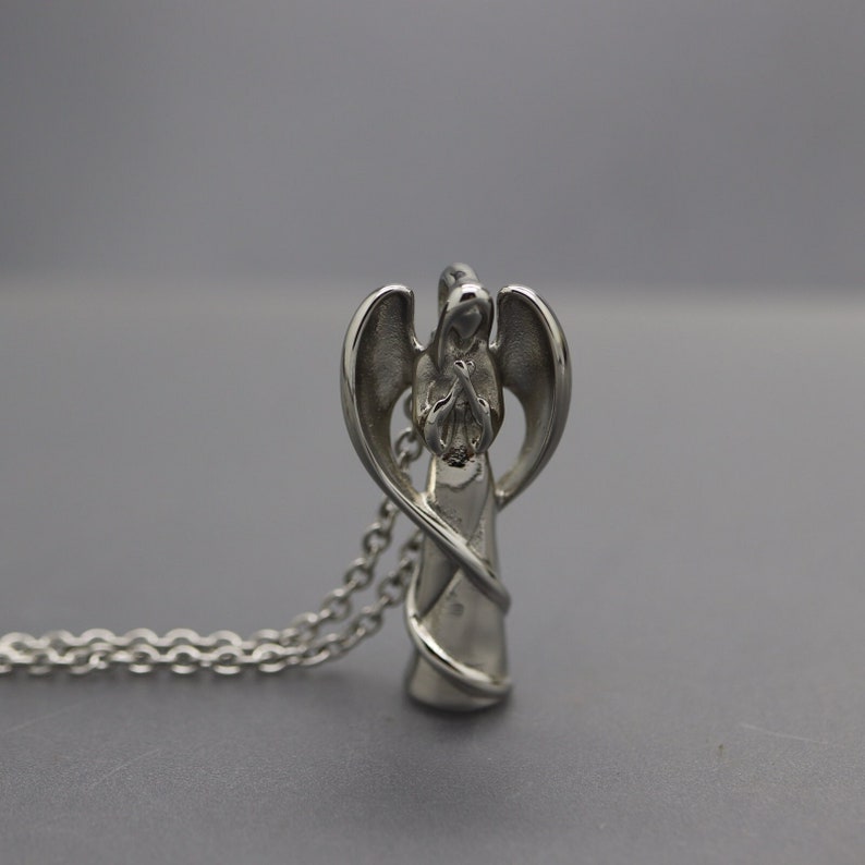Ängelminnesgåva, Ängelurnahalsband, Kristen sorg, Änglavingarhänge, Kremeringsmedaljong för aska, Minnessak av mänsklig aska, Kremeringsaska bild 1