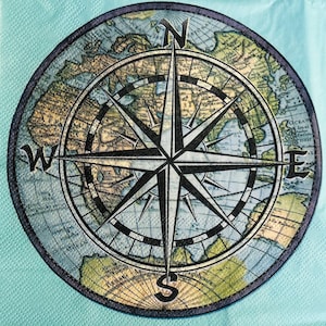 May include: Circular design featuring a compass rose overlaid on a vintage world map. The compass has directional indicators (N, S, E, W) and a starburst design. The map is in shades of green, brown, and blue, set against a light blue background.