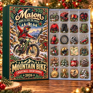 May include: A Mountain Bike Christmas Countdown 2026 advent calendar box featuring a cyclist on the cover and twenty-four individual compartments containing miniature mountain biking gear, tools, accessories, and holiday-themed ornaments.