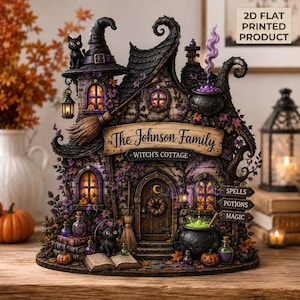 May include: A 2D flat printed witch's cottage sign featuring a dark house with a black cat, a broom, and a cauldron. The sign displays the text The Johnson Family, Witch's Cottage, Spells, Potions, and Magic, decorated with purple and orange autumn leaves.