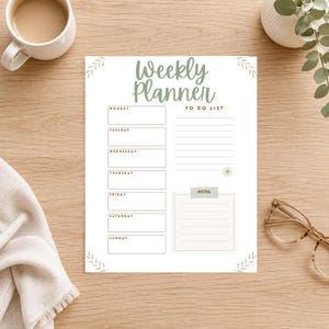 May include: A white weekly planner sheet featuring the text Weekly Planner in sage green script at the top. It includes seven rectangular boxes for each day of the week, a lined to-do list section, and a separate notes box with a sage green header.