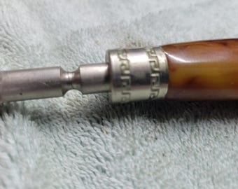 vintage bake light handle knife hone.  from 1920-1930s