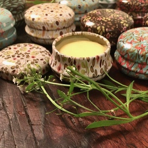 deeply nourishing shea butter, olive oil and beeswax lip balm with essential oil