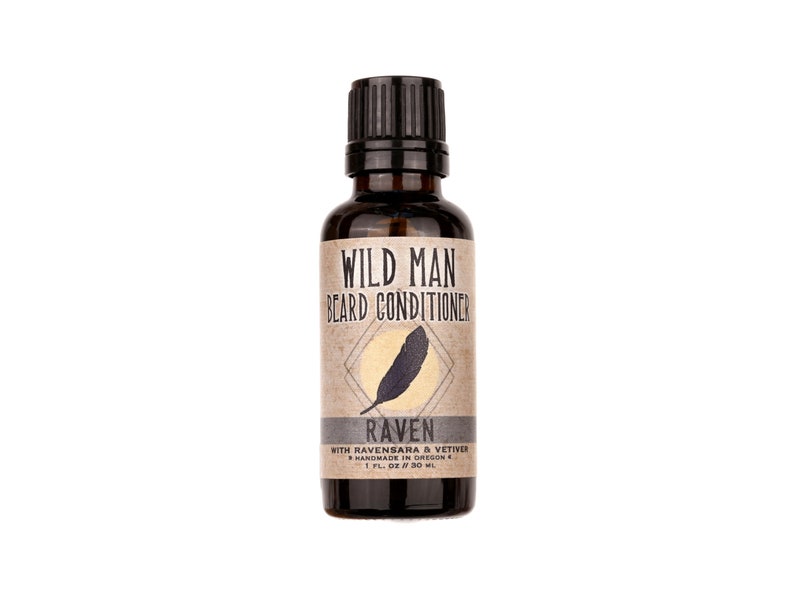 Wild Man Beard Oil Conditioner - Raven scent in 30ml amber glass bottle on a white background.