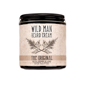 Wild Man Beard Cream in The Original scent shown in a 1oz amber glass jar on a white background.