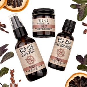 Wild Man beard care set in Tundra scent with 30ml Beard Conditioner, 2oz Beard Wash and 1oz Beard Cream. Lemon slices and peppermint leaves surround.