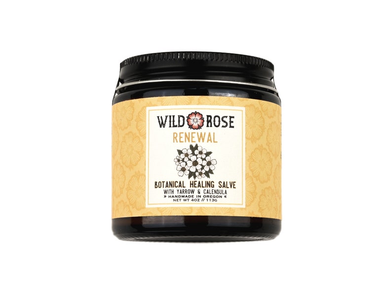 Renewal Healing Salve in a 4oz amber glass jar on a white background.