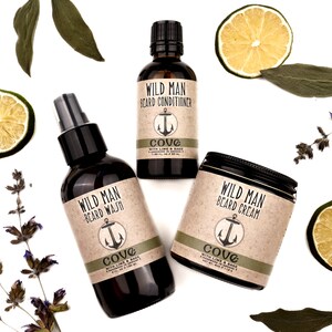 Wild Man beard care set in Cove scent with 50ml Beard Conditioner, 4oz Beard Wash and 4oz Beard Cream. Lime slices and sage leaves surround.