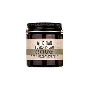 Wild Man Beard Cream Cove scent in 1oz amber jar on white background.