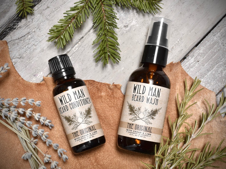 Wild Man beard Care Gift Set with Beard Oil Conditioner and Beard Wash in The Original scent. Dried botanicals surround.