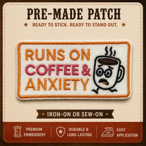 May include: A rectangular embroidered patch with a white background and orange border. It features the text RUNS ON COFFEE & ANXIETY in orange and pink, alongside a cartoon coffee mug character with glasses and a mustache, with steam rising above.