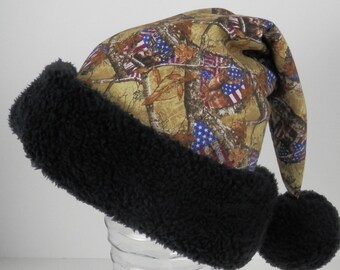 Camo Santa Hat: Outdoorsman Tree Camo, American Flag, Black Sherpa Trim